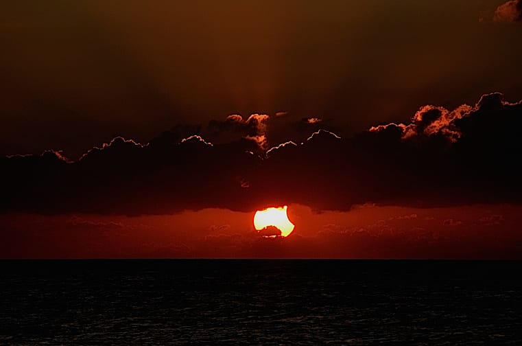 Sanibel Solar Eclipse At Sunset, 10-23-14, Photo Credit - Georgianne Nienaber.