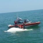 Four Rescued Safely From Capsized Boat
