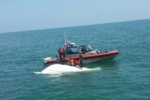 Sanibel Rentals, 4-26-15, Capsized Boat, Sanibel, Courtesy- Eric Schmidt Sea Trek fishing.